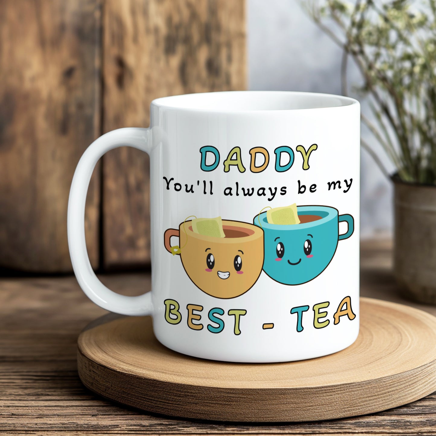 White mug with cartoon tea cups and text on a wooden coaster