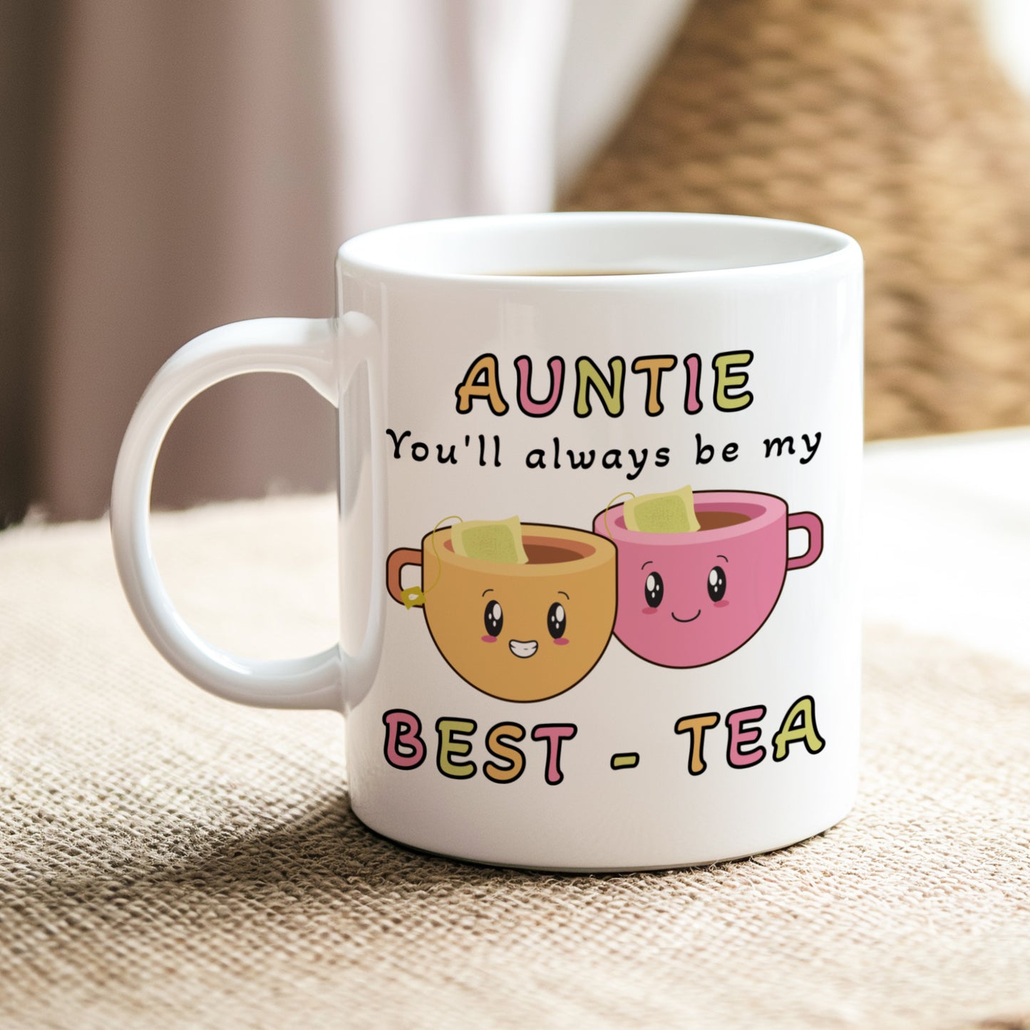 White mug with cartoon tea cups and text on a textured surface