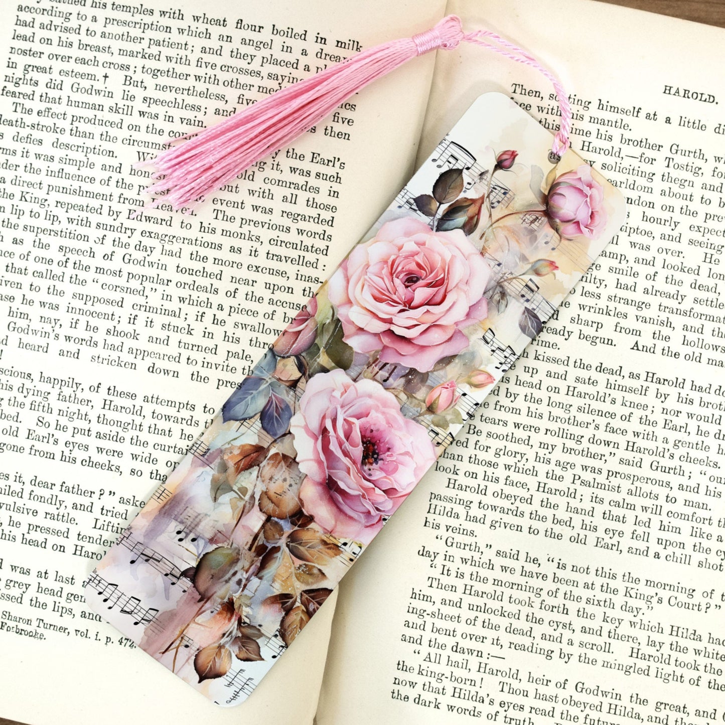 Floral and music sheet design bookmark on an open book