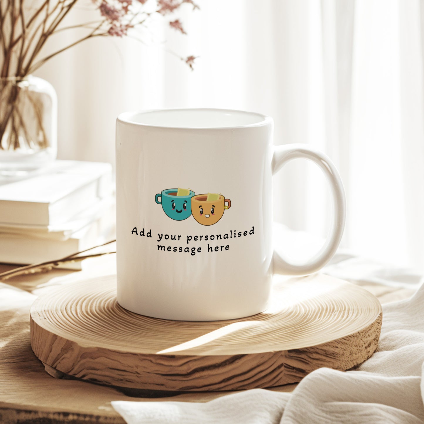 White mug with cartoon designs on a wooden coaster, surrounded by books and a vase.