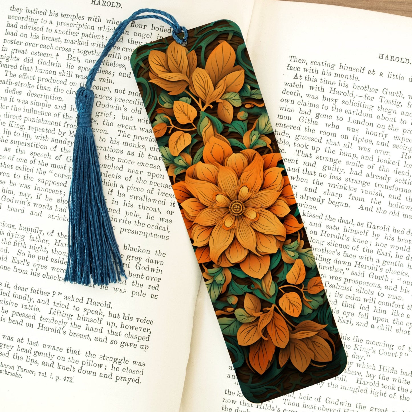 Floral bookmark with tassel on an open book