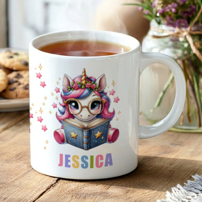 Personalised bookish unicorn mug featuring a whimsical unicorn reading a book, customised with a name in colourful font