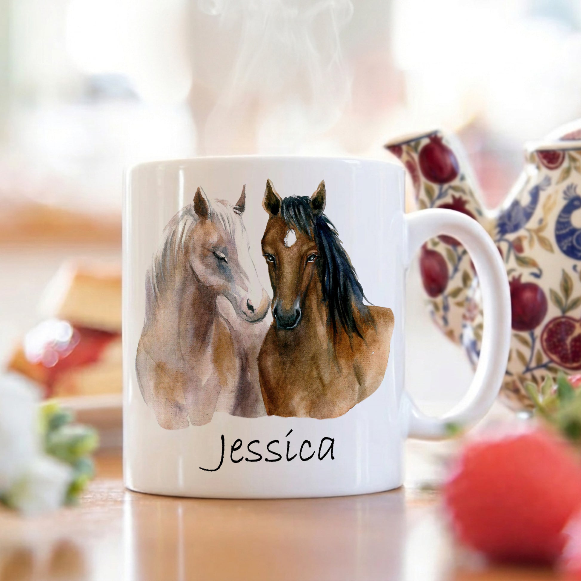 White mug with horse design and 'Jessica' text on a blurred background