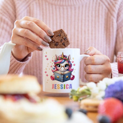 Close-up of personalised unicorn mug showing vibrant colourful name font with magical unicorn design
