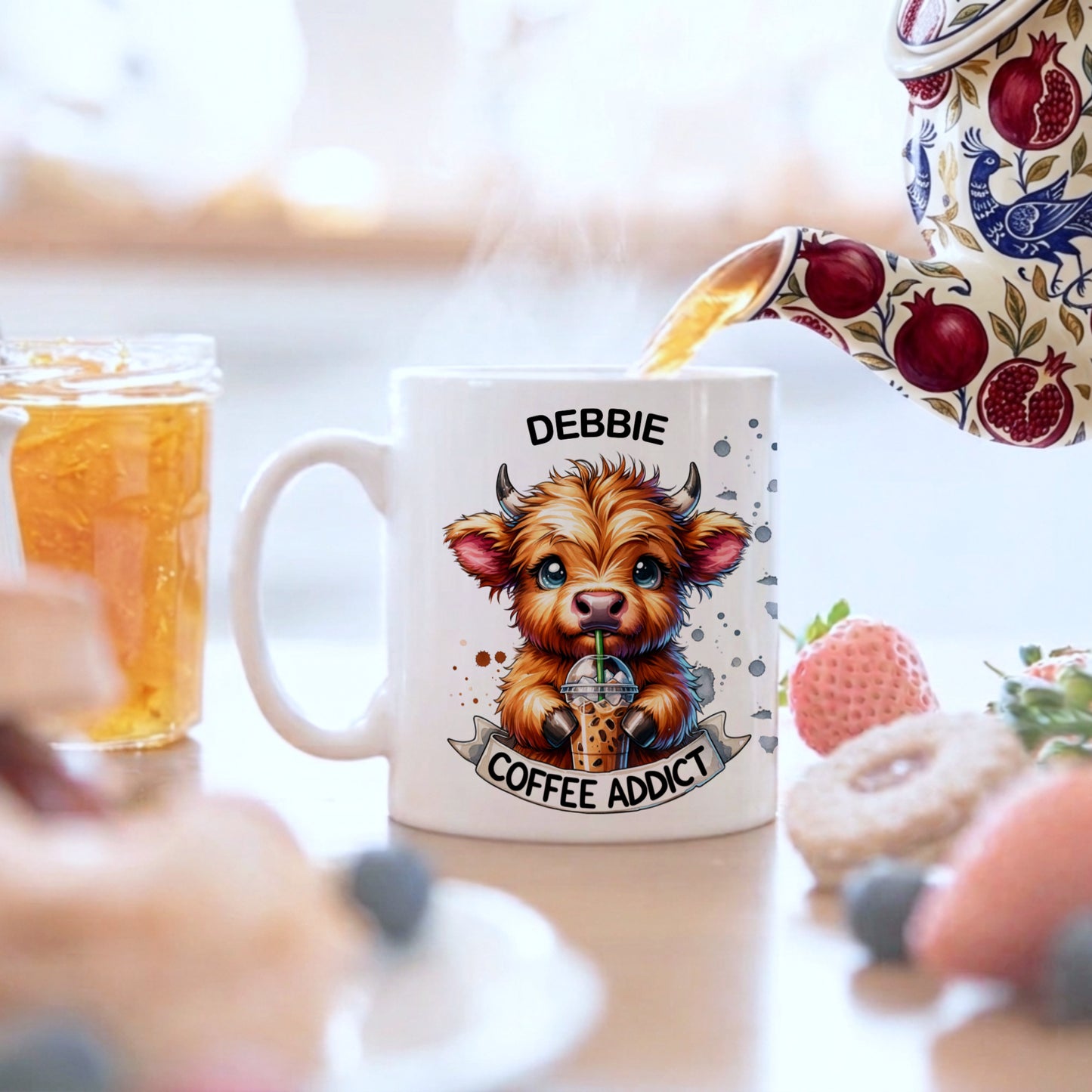 Mug with a cartoon cow design and text 'Debbie Coffee Addict' being filled with tea.
