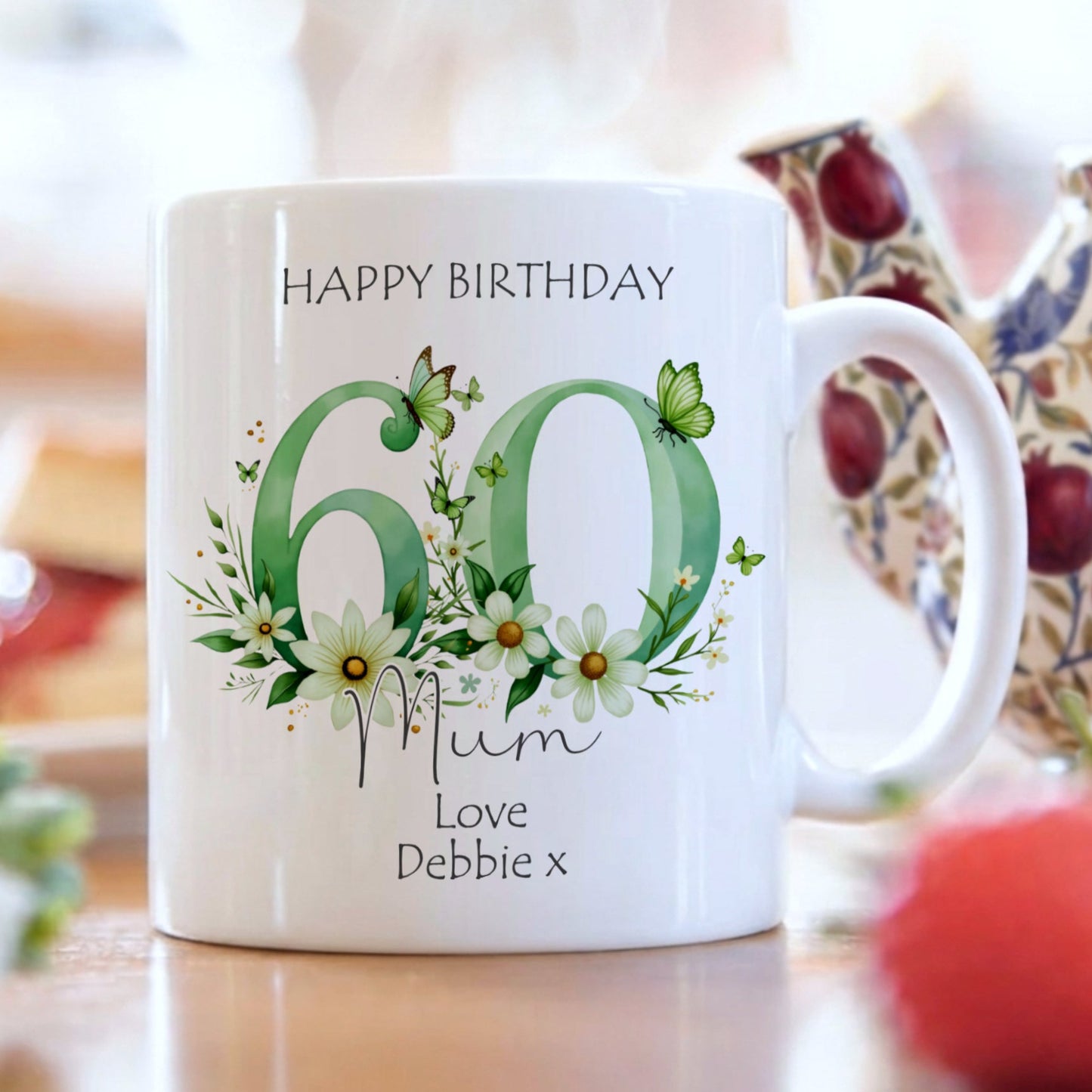 White mug with floral design and text on a blurred background