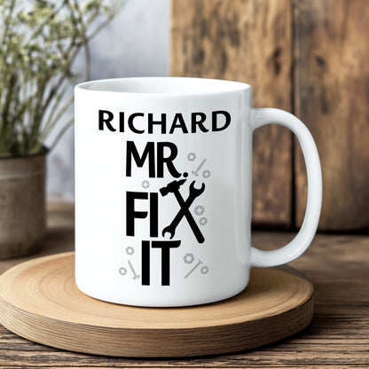 White mug with 'Richard Mr. Fix It' text on a wooden coaster