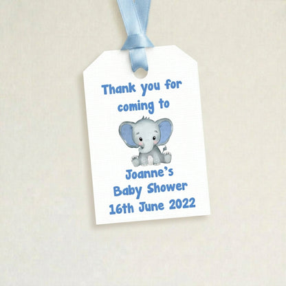 Baby shower favour tag with elephant design and personalised text on a beige background