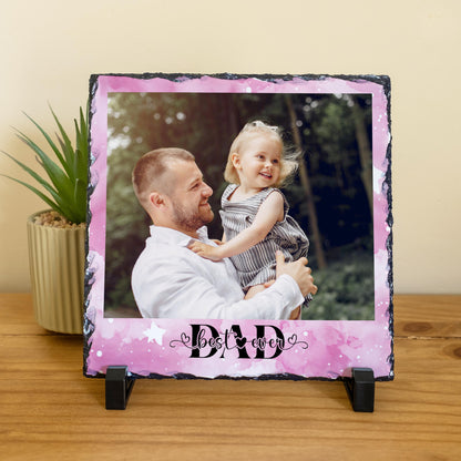 Personalised Best Ever Dad photo slate with pink watercolour background, showing a dad holding his daughter, with two black display stands