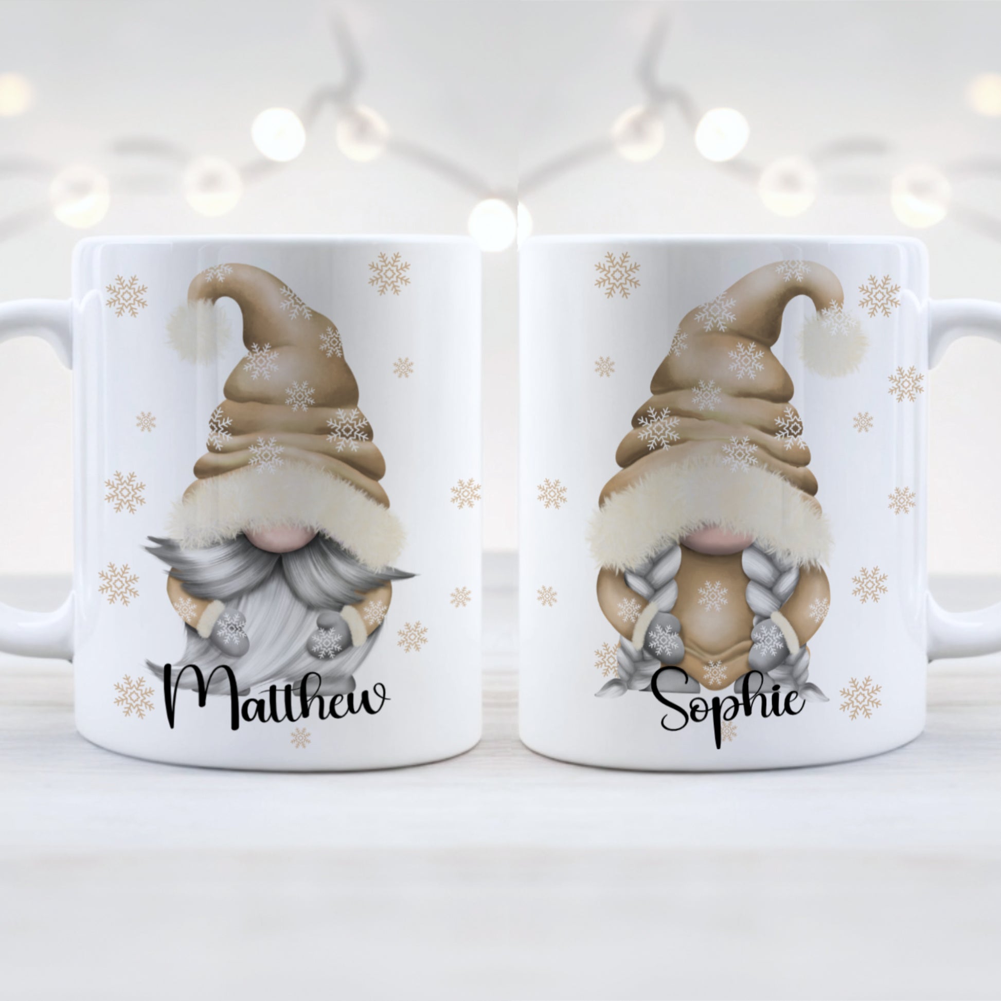 Two white mugs with gnome illustrations and names 'Matthew' and 'Sophie' on a light background.