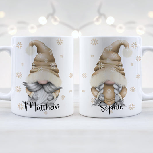 Two white mugs with gnome illustrations and names 'Matthew' and 'Sophie' on a light background.