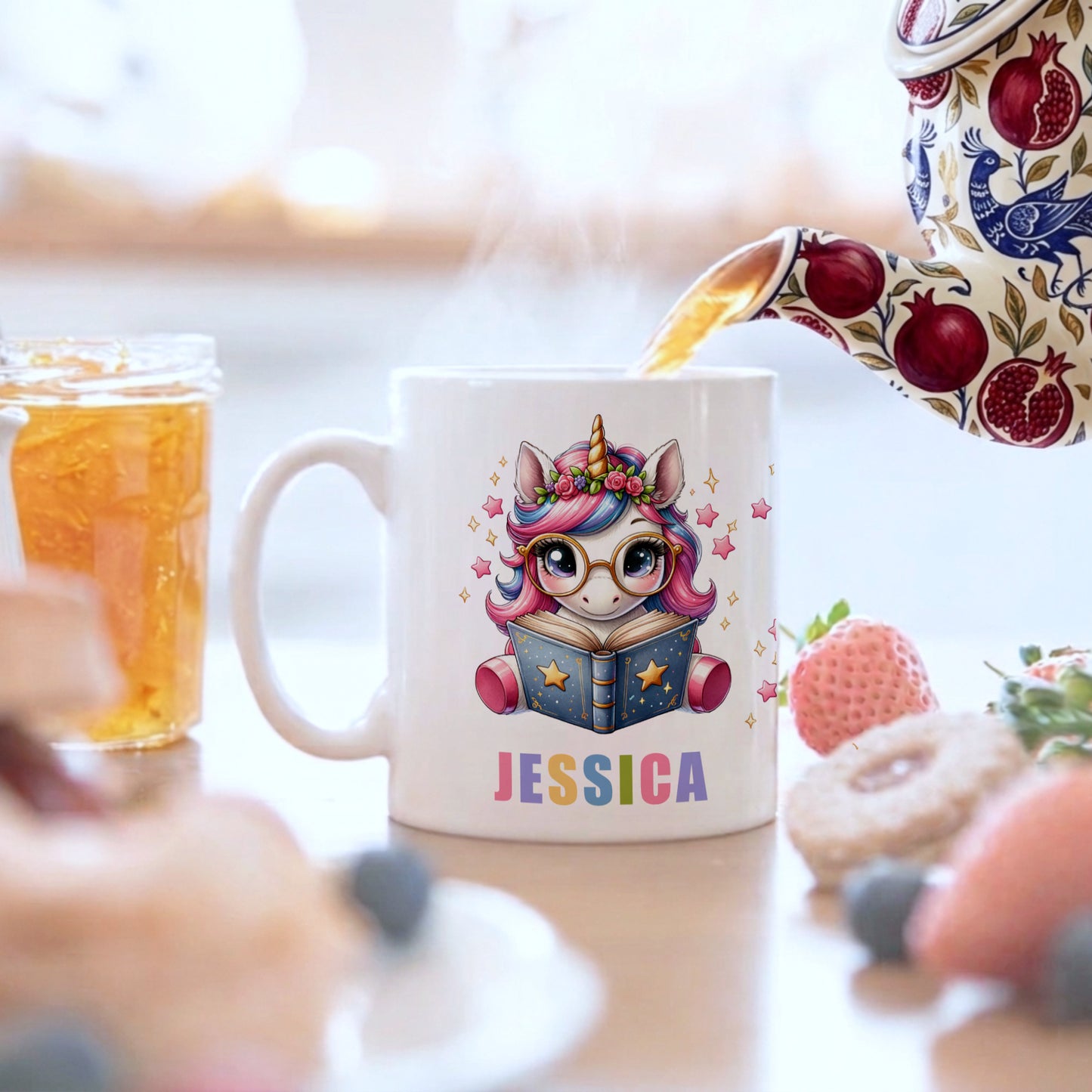 Mug with a unicorn design and 'Jessica' text, being filled with tea.