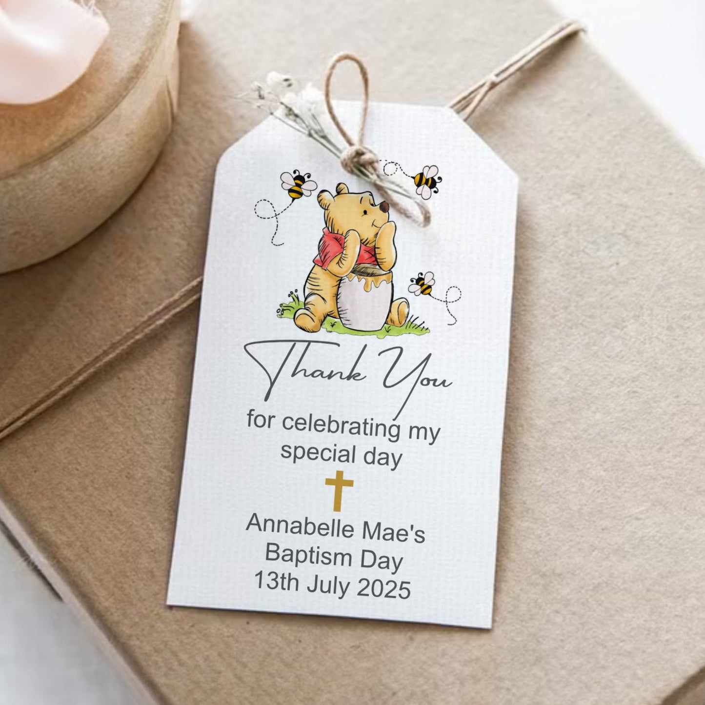 Gift tag with Winnie the Pooh design on a brown envelope