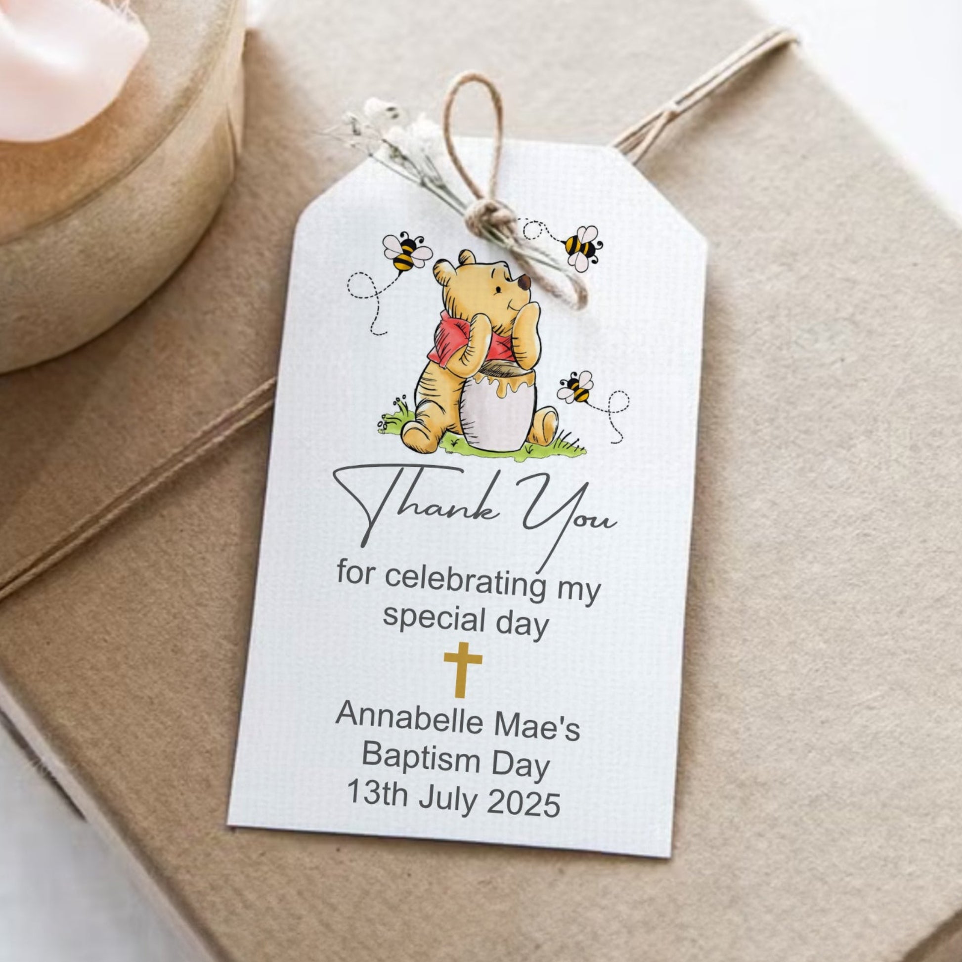 Gift tag with Winnie the Pooh design on a brown envelope