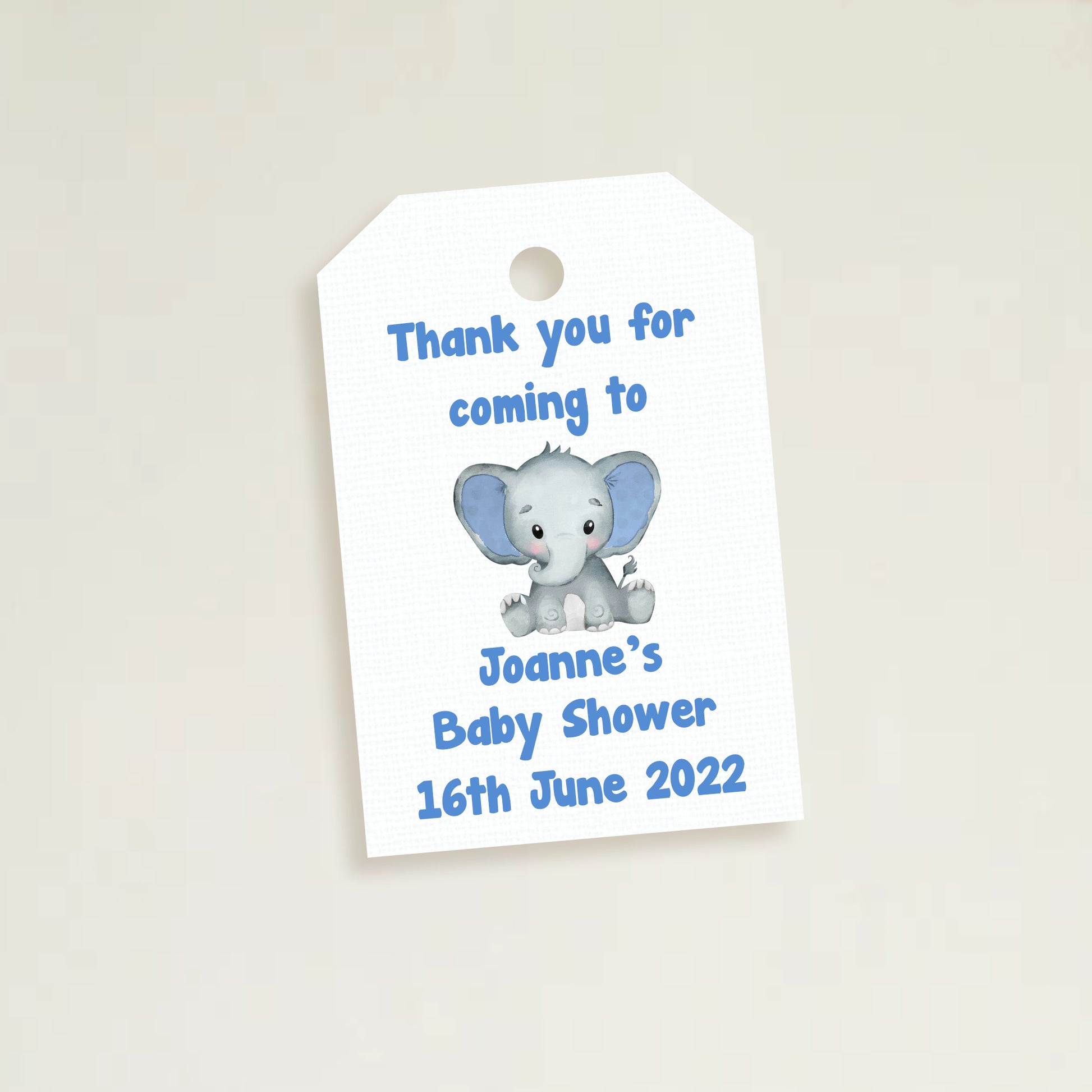 A set of three personalized elephant baby shower thank you tags with different colors and names customized for a baby shower event.