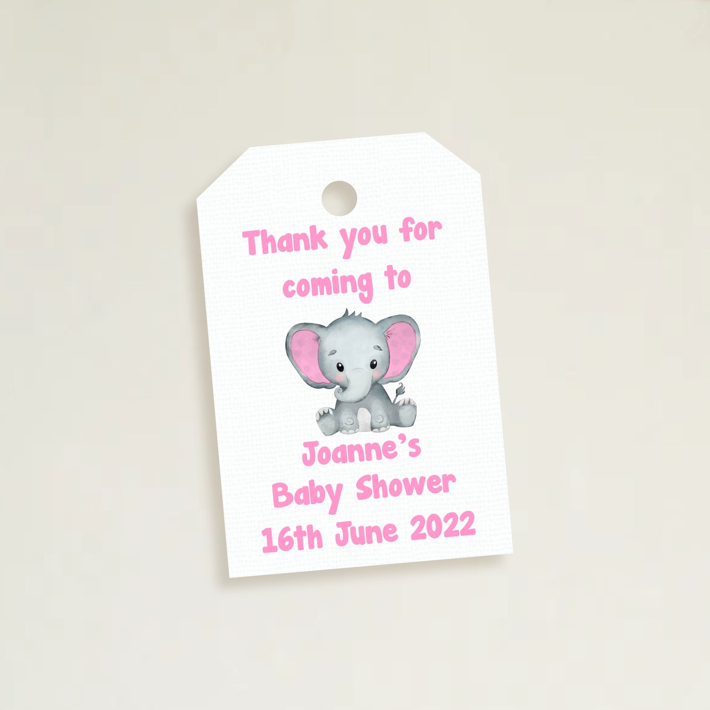 A set of three personalized elephant baby shower thank you tags with different colors and names customized for a baby shower event.