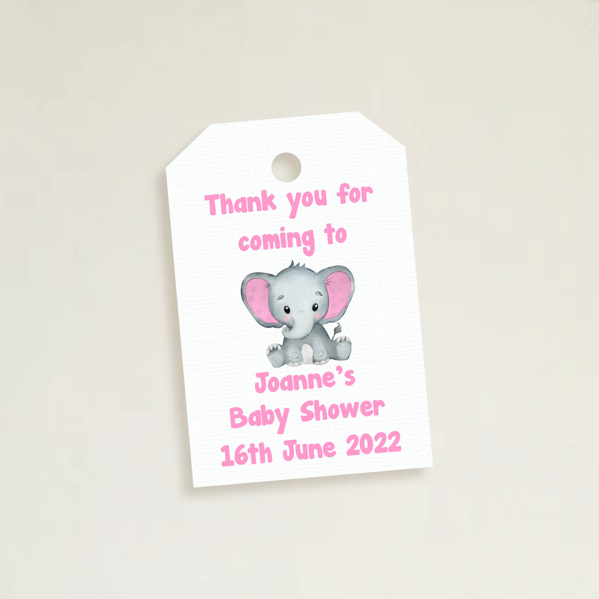 A set of three personalized elephant baby shower thank you tags with different colors and names customized for a baby shower event.