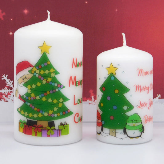Two Christmas-themed candles with decorative designs on a red background