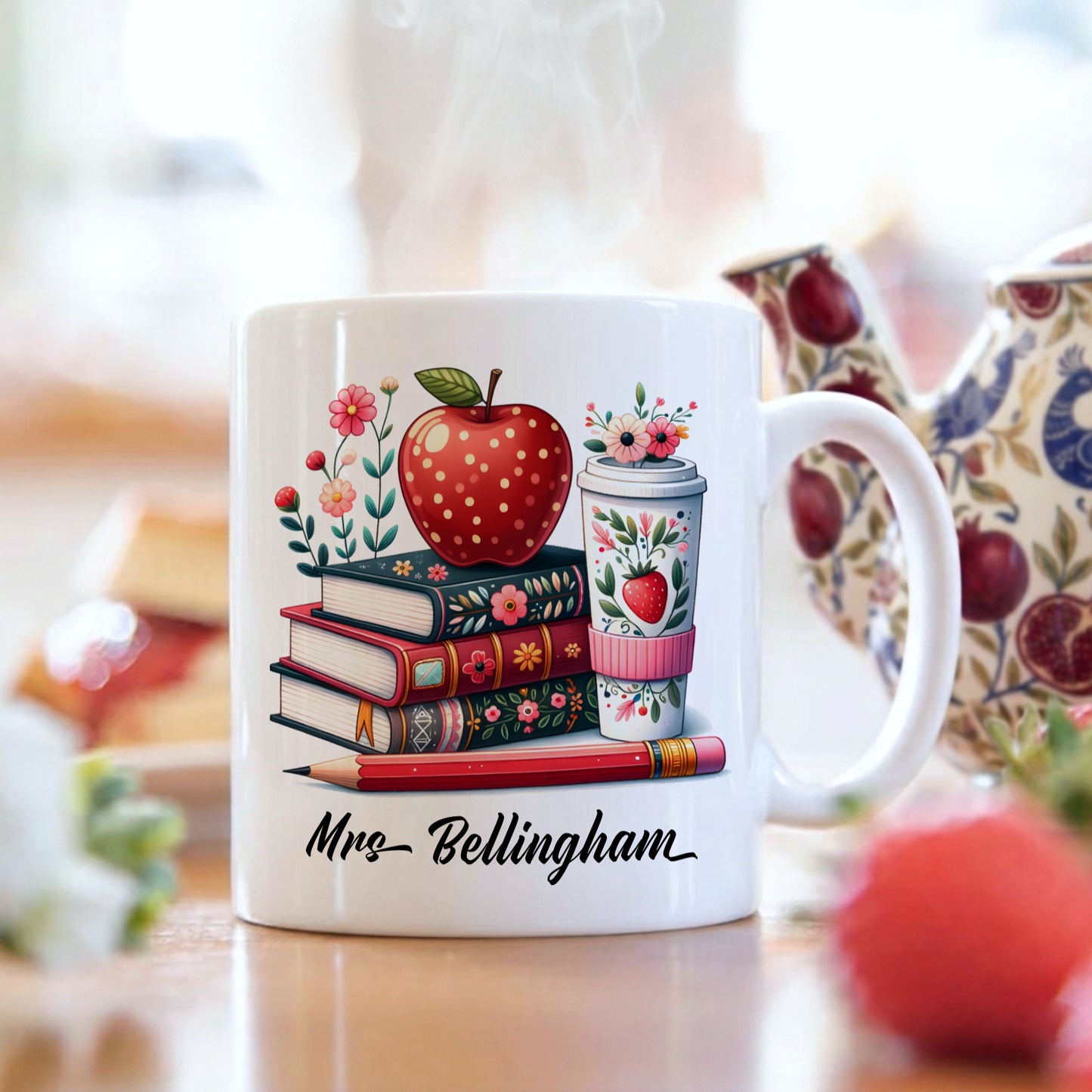 Personalised teacher mug with colourful stacked books and red apple design, customised with a teacher's name