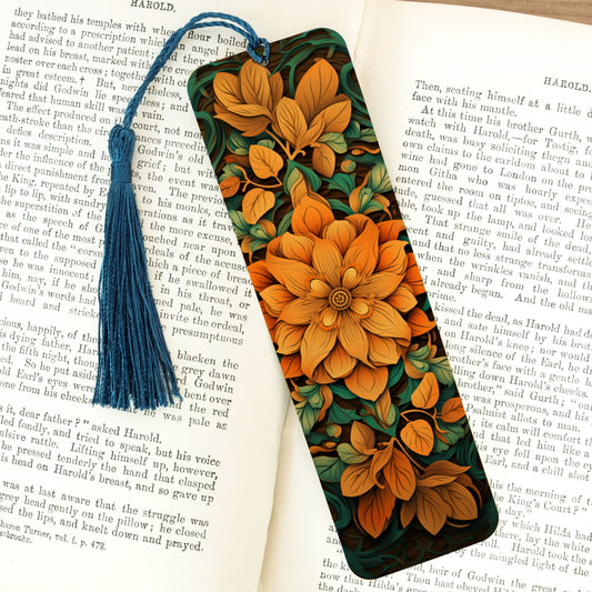 Floral bookmark with tassel on an open book